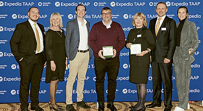 TAAP-Manager Robin Lawther (dritter von links) mit Deutschland-Chefin Margit Strohm (zweite von links) und Top-Partnern auf einem TAAP-Event in Düsseldorf. Foto: Expedia TAAP