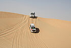 Mit Landcruisern über die Dünen rund 50 Kilometer von Abu Dhabi entfernt