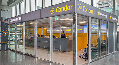 Das neue Service-Center befindet sich beim Condor-Check-in in Halle C