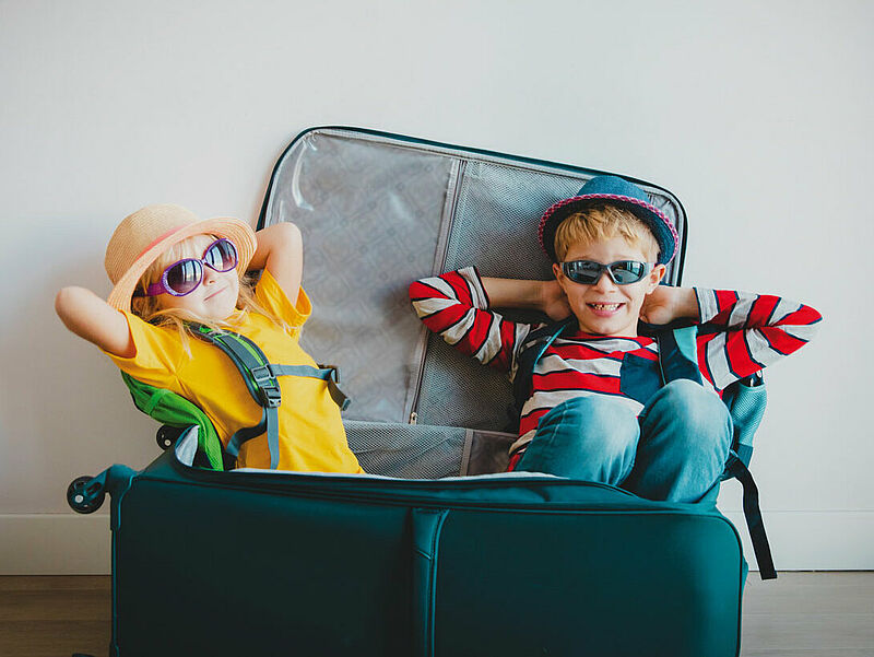 Koffer packen und ab in den Urlaub – davon träumen im Moment viele, doch die wenigsten buchen. Flex-Pakete sollen hier Abhilfe schaffen. Foto: Nadezhda1906 / iStockphoto