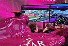Formel 1-Simulator am Stand von Qatar Airways