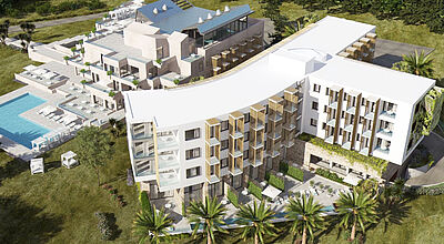 Modell von zwei mehrstöckigen Gebäuden mit einem großen Pool und viel Grün drumherum