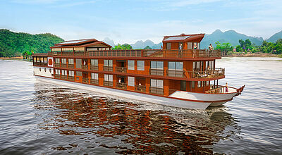 Ein modernes Boutique-Kreuzfahrtschiff gleitet majestätisch über den Mekong-Fluss. Die traditionelle asiatische Architektur verschmilzt harmonisch mit zeitgenössischem Luxus und bietet den Gästen eine einzigartige Perspektive auf die dramatische Berglandschaft.