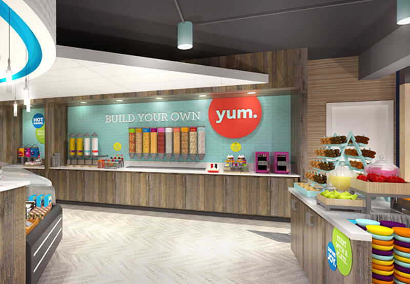 Blick in den bunten Frühstücksbereich bei der neuen Marke Tru by Hilton