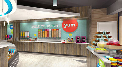 Blick in den bunten Frühstücksbereich bei der neuen Marke Tru by Hilton