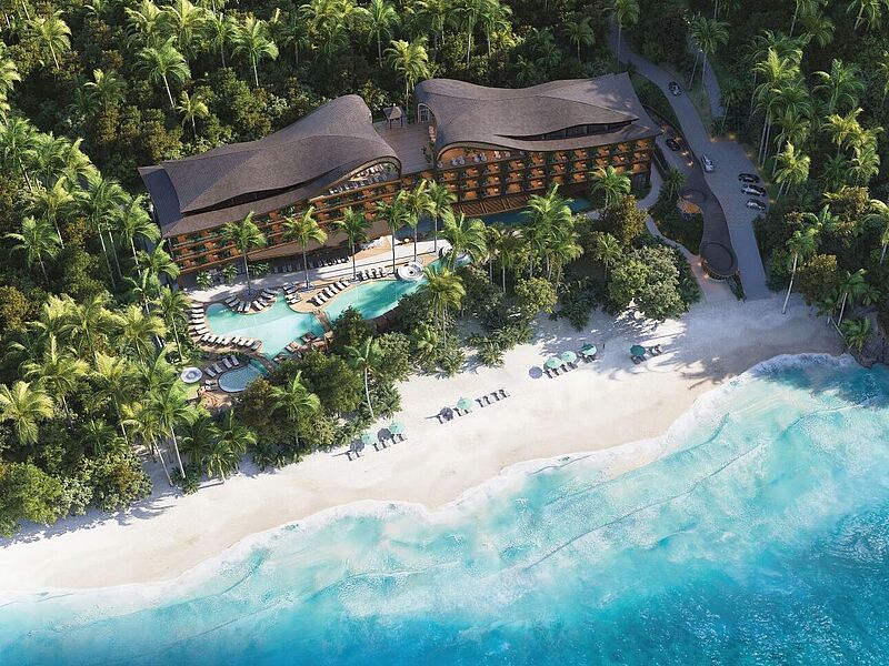 Das Salt of Virgin Beach soll 2028 in der Region Karangasem im Osten Balis eröffnen. Foto: The Lux Collective Luxuriöses Strandresort mit Infinity-Pool in tropischer Umgebung – modernes Hotel direkt am weißen Sandstrand mit türkisblauem Meer, Palmen und exklusiven Sonnenliegen, ideal für karibischen Traumurlaub und nachhaltigen Ökotourismus.