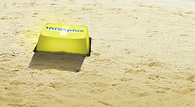 Computer-Taste im Sand