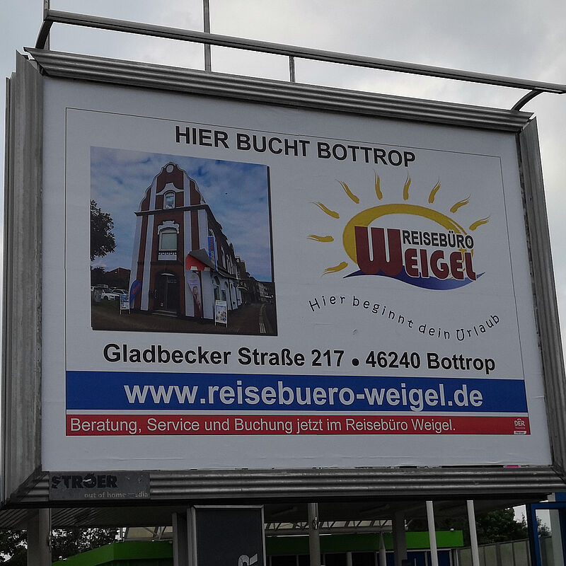 Plakatwand des Reisebüros Weigel in Bottrop