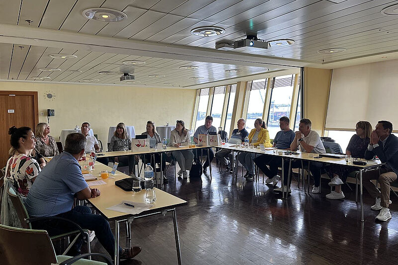 Reiseverkäufer im direkten Austausch auf der Aida Sol. Foto: Reiseland