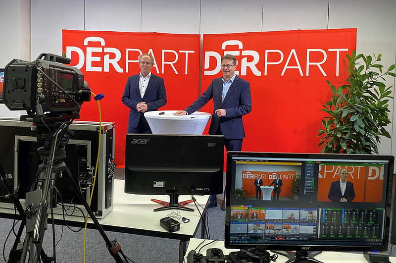 Die Derpart-Geschäftsführer Andreas Neumann und Aquilin Schömig auf der virtuellen Jahrestagung