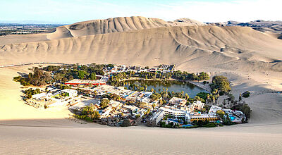 Auch das ist Peru: Oase Huacachina bei Ica. Foto: tobiasjo / iStock