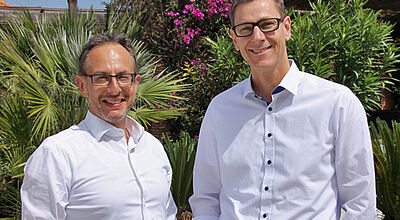 Take-Off-Chef Kurt Koch (links) mit Peter Wittmann, Chef des TUI-Filialvertriebs, auf der Jahrestagung in Portugal
