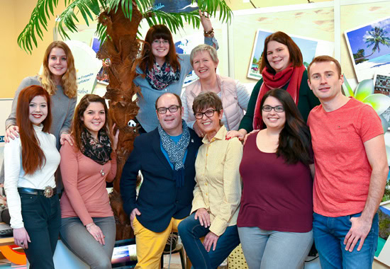 Zufriedene Mitarbeiter: das Team von MKR Reisen in Ludwigshafen