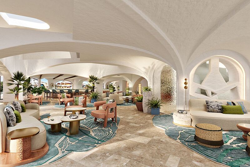 Modernes Hotel-Lobby-Design im mediterranen Stil mit eleganten Sitzmöbeln, Natursteinböden, Pflanzen und stilvoller Bar im Hintergrund – W Hotel Costa Smeralda, Sardinien