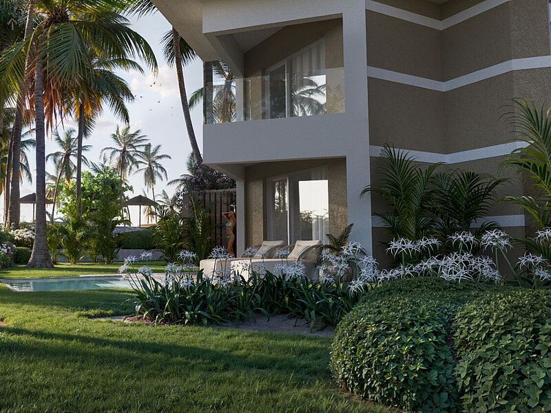 Exklusive Suite mit privatem Pool im tropischen Garten des Palladium Hotels – luxuriöse Sonnenliegen, üppige Palmenlandschaft und direkter Zugang zum Strand für einen traumhaften Karibikurlaub.