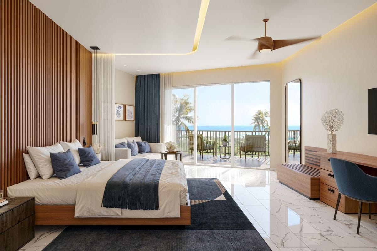 Ein modernes Hotelzimmer mit großem Doppelbett, dunklen Akzenten, Marmorboden und einem Balkon mit Blick auf das Meer und Palmen bei hellem Tageslicht.